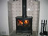 Woodburning stove with delft tiled backdrop